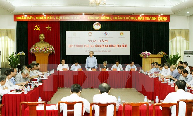 Quang cảnh một buổi tọa đàm góp ý vào Văn kiện Đại hội XII của Đảng. (Ảnh minh họa. Nguyễn Dân/TTXVN)