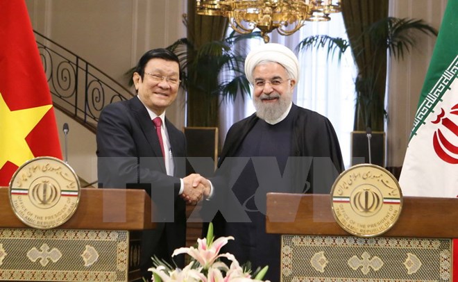 Chủ tịch nước Trương Tấn Sang và Tổng thống Cộng hòa Hồi giáo Iran Hassan Rouhani tại cuộc gặp gỡ báo chí. (Ảnh: Nguyễn Khang/TTXVN)