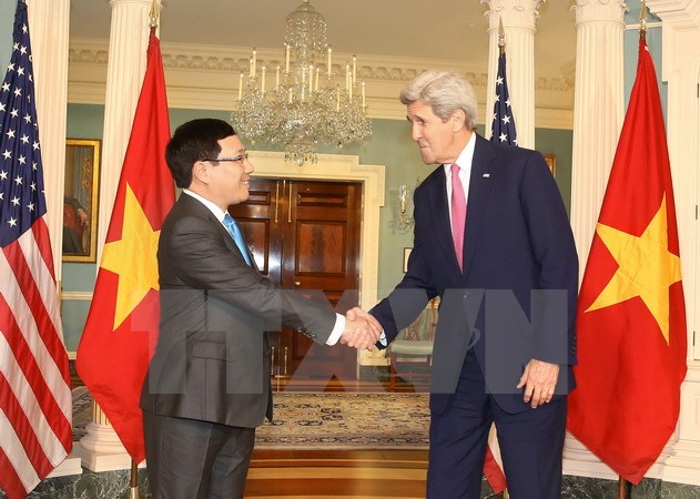 Phó Thủ tướng, Bộ trưởng Ngoại giao Phạm Bình Minh hội đàm với Ngoại trưởng Mỹ J.Kerry . (Ảnh: Thanh Tuấn/TTXVN)