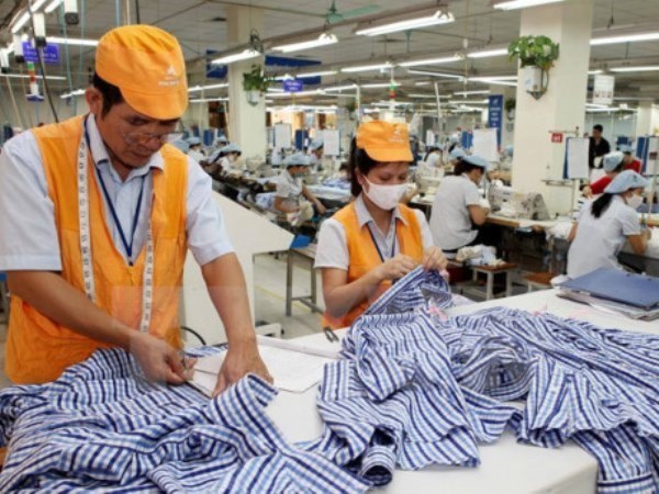  Hiện nay, những người về hưu trước tuổi đa số là công nhân lao động. (Ảnh minh họa: TTXVN)