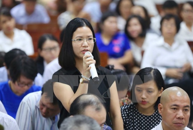 Bị cáo Nguyễn Thị Nga, nguyên Trưởng Ban Tài chính kế hoạch OceanBank trả lời câu hỏi thẩm vấn. (Ảnh: Doãn Tấn/TTXVN)