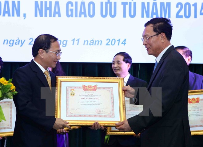 Lễ trao tặng danh hiệu Nhà giáo Nhân dân, Nhà giáo ưu tú năm 2014. (Ảnh: Quý Trung/TTXVN)