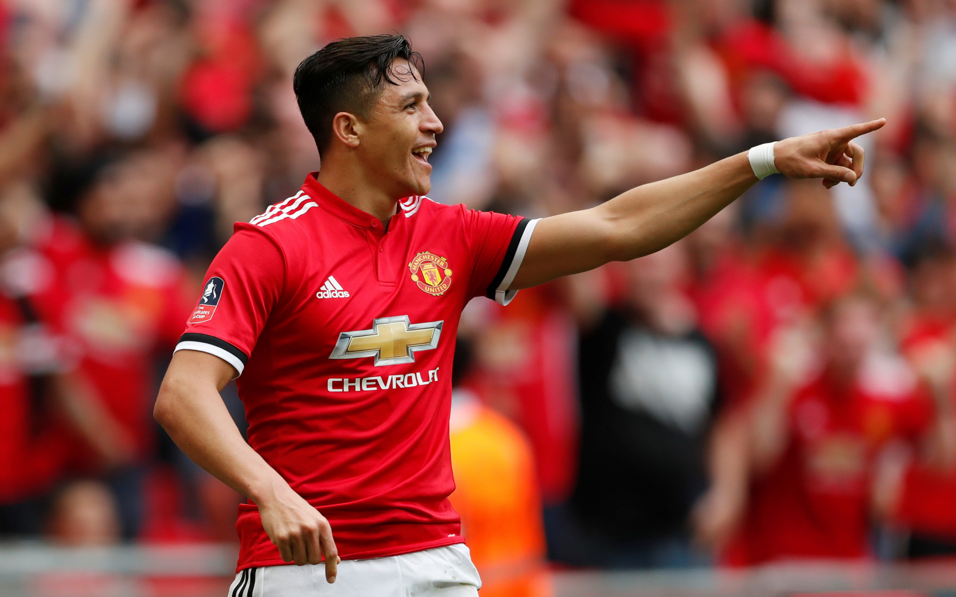 Sanchez ăn mừng bàn thắng vào lưới Tottenham. Ảnh: REUTERS