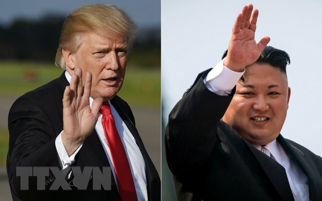 Tổng thống Donald Trump (trái) với nhà lãnh đạo Triều Tiên Kim Jong-un (phải). (Nguồn: AFP/TTXVN)