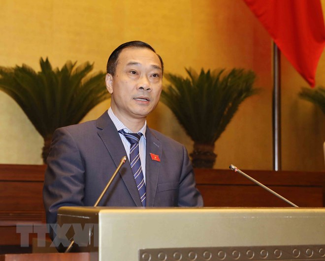 Chủ nhiệm Ủy ban Kinh tế của Quốc hội Vũ Hồng Thanh trình bày Báo cáo giải trình, tiếp thu, chỉnh lý dự án Luật Cạnh tranh (sửa đổi). (Ảnh: Phương Hoa/TTXVN)