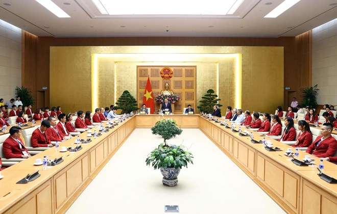 Quang cảnh buổi gặp mặt. (Ảnh: Thống Nhất/TTXVN)