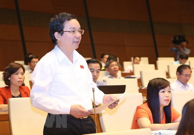 Đại biểu Quốc hội thành phố Hà Nội Hoàng Văn Cường phát biểu ý kiến. (Ảnh: Doãn Tấn/TTXVN)