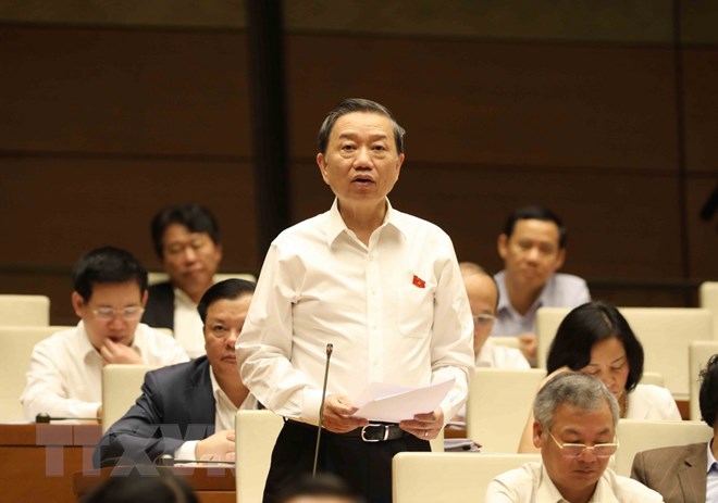 Bộ trưởng Bộ Công an Tô Lâm trả lời chất vấn. (Ảnh: Phương Hoa/TTXVN)