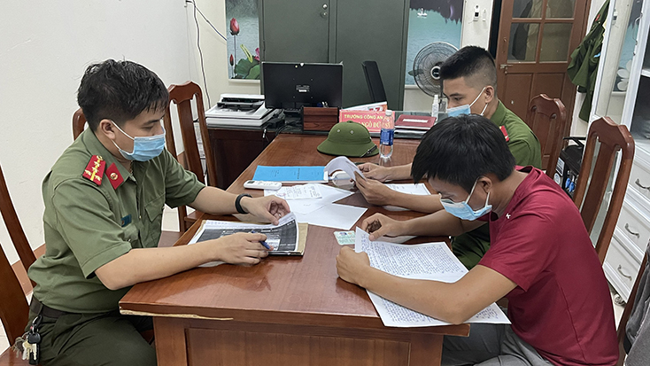 Đối tượng L.Q.D làm việc với cơ quan Công an.